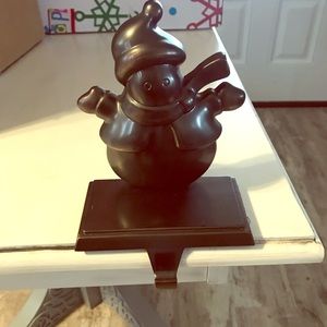 4 bronze snowman stocking holders
